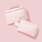 Trousse de maquillage rose clair